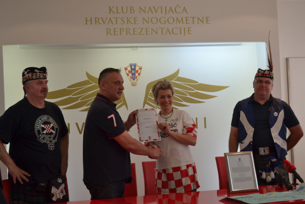 Croatian Fans present their cheque to Željka Vučko of Palčić Gore